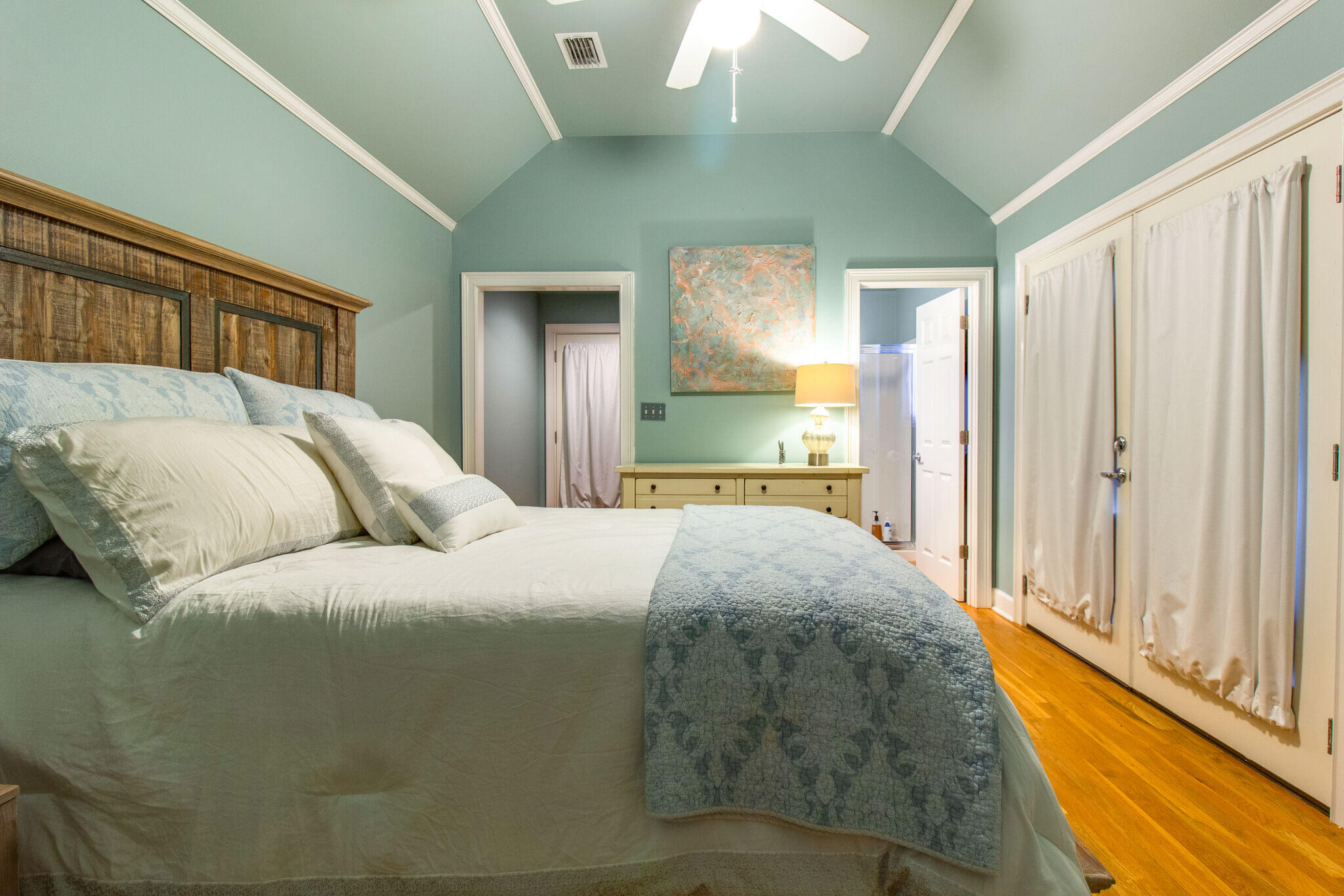 2113 Clipper Cove Miramar Beach, FL 32550 - Photo 24 of 29 a bedroom with a bed and a large window