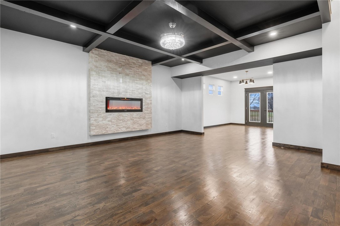 3509 South State Rte 72 Sabina, OH 45169 - Photo 5 of 44 This expansive space features rich hardwood flooring and a stylish fireplace, ideal for memorable gatherings.