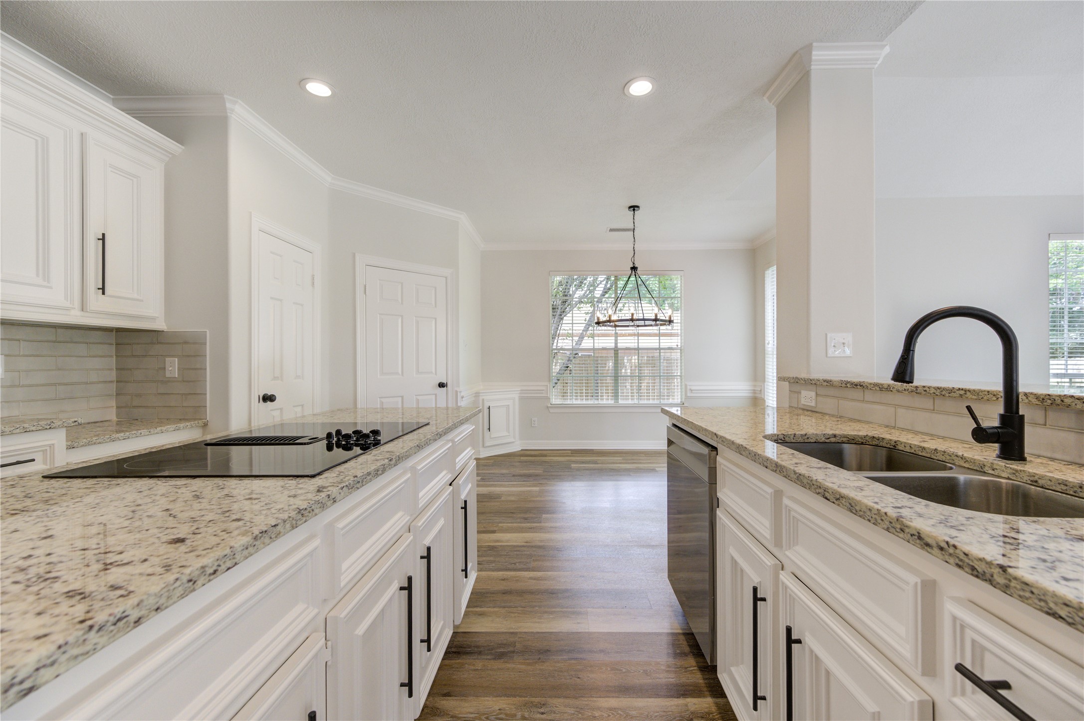 17318 Bonnard Circle Spring, TX 77379 - Photo 21 of 45 There is a new deep double stainless sink and a new pull-down faucet, and a raised bar area for barstools.