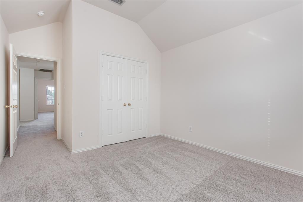 915 Falcon Trail Murphy, TX 75094 - Photo 37 of 40 an empty room with a bathroom
