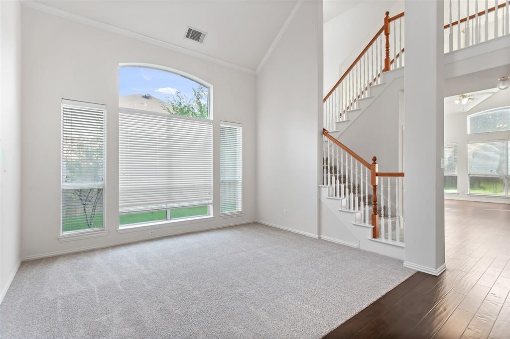 915 Falcon Trail Murphy, TX 75094 - Photo 5 of 40 a view of livingroom with furniture and stairs