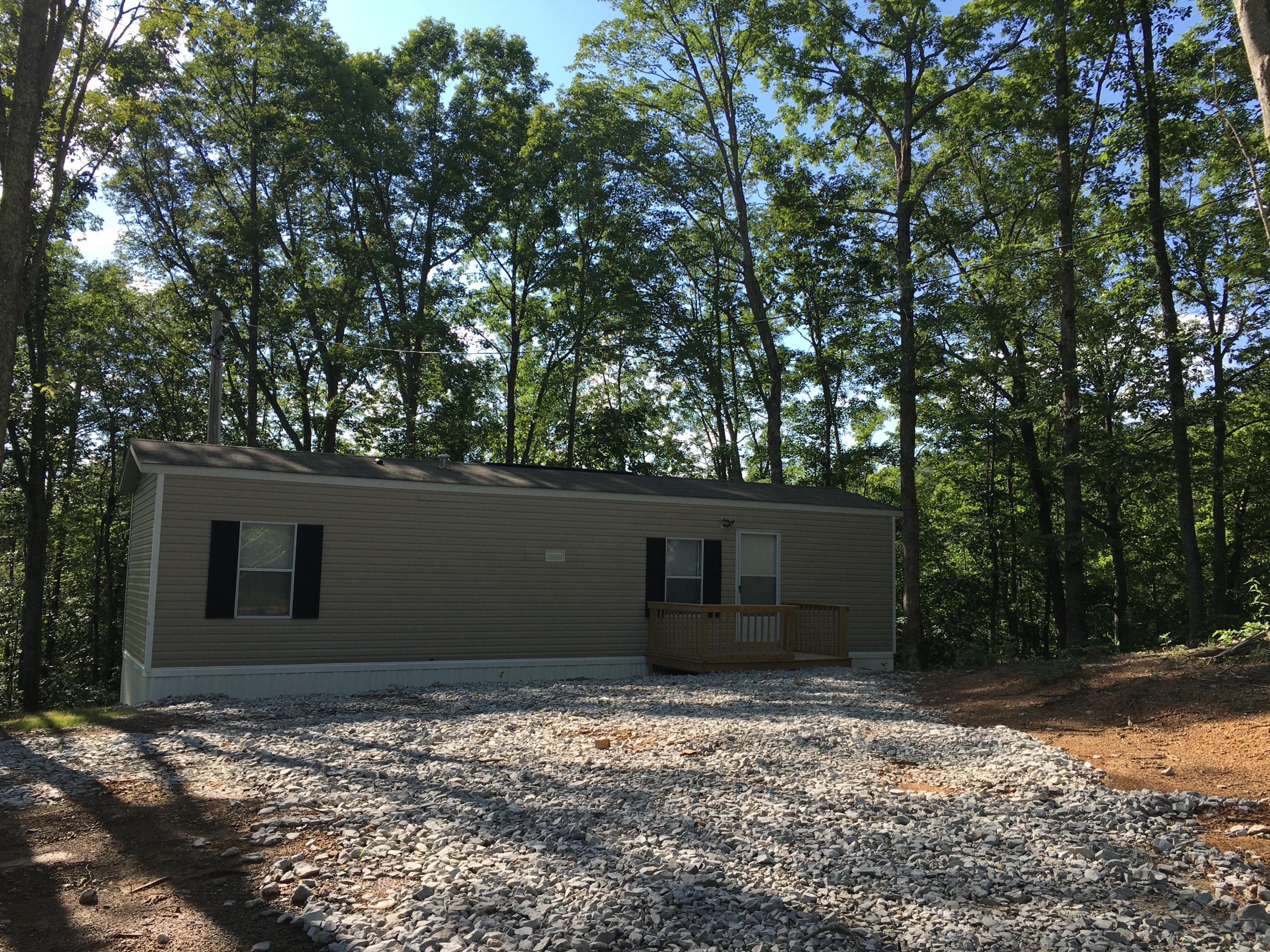 4135 Pleasant Grove Road Winfield, TN 37892 - Photo 1 of 9 64EB90E0-8816-4294-AF75-62806A3ECF69