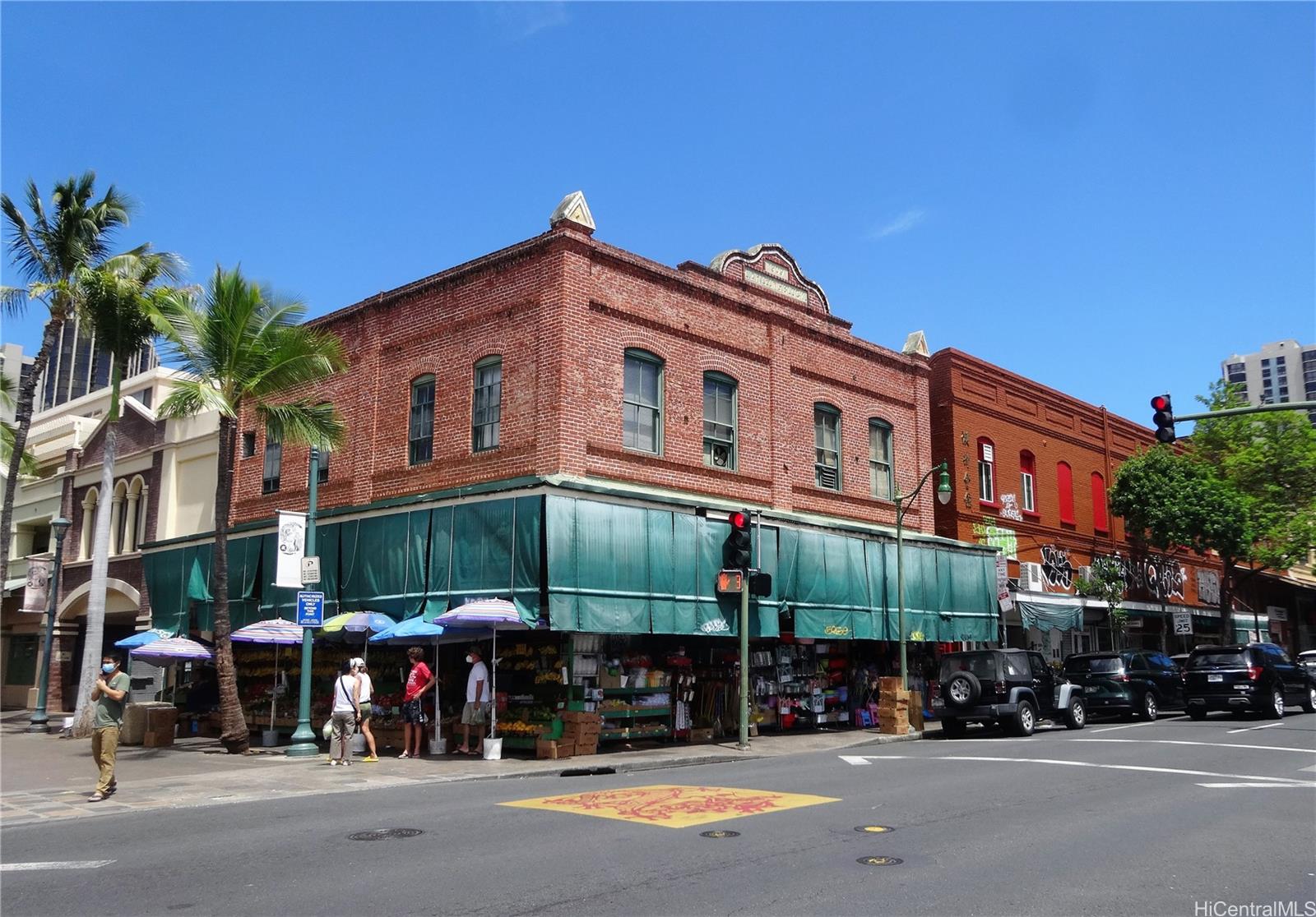 1581 Murphy Street Honolulu, HI 96819 - Photo 4 of 7 a street view of a building with a street and a car parked