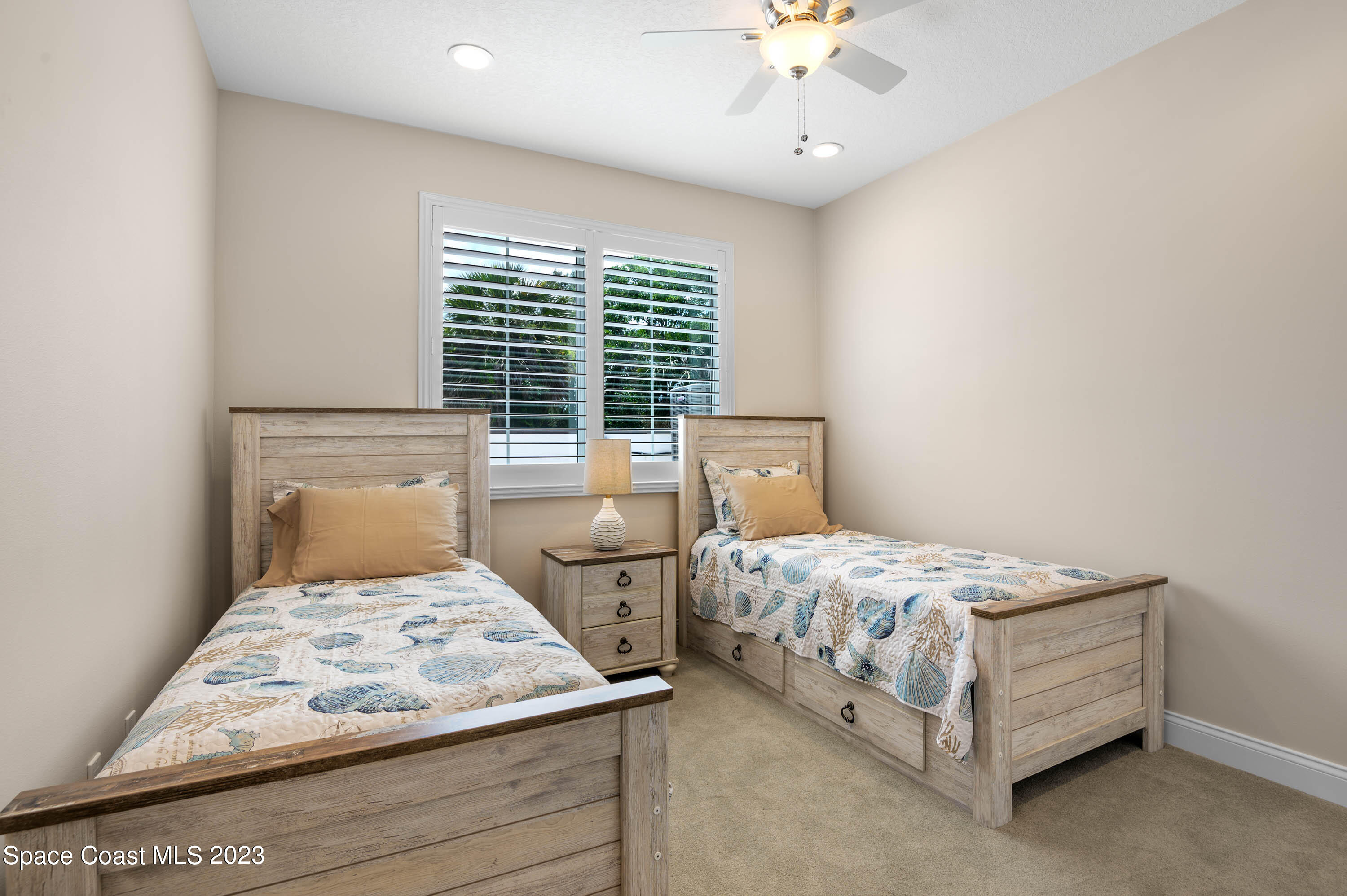 2240 Enjoya Lane Melbourne, FL 32901 - Photo 17 of 31 a bedroom with a bed and window