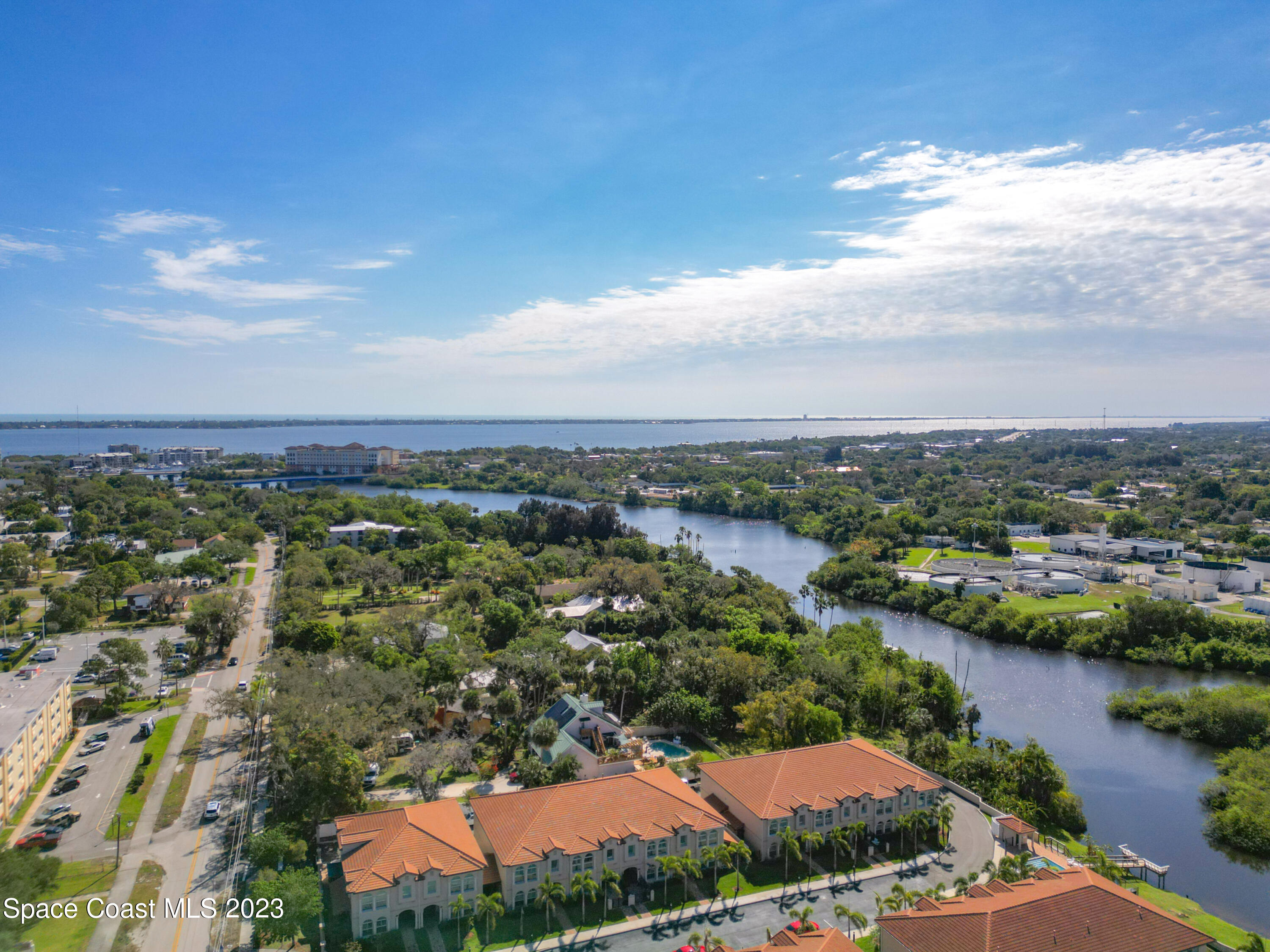 2240 Enjoya Lane Melbourne, FL 32901 - Photo 22 of 31 an aerial view of a city