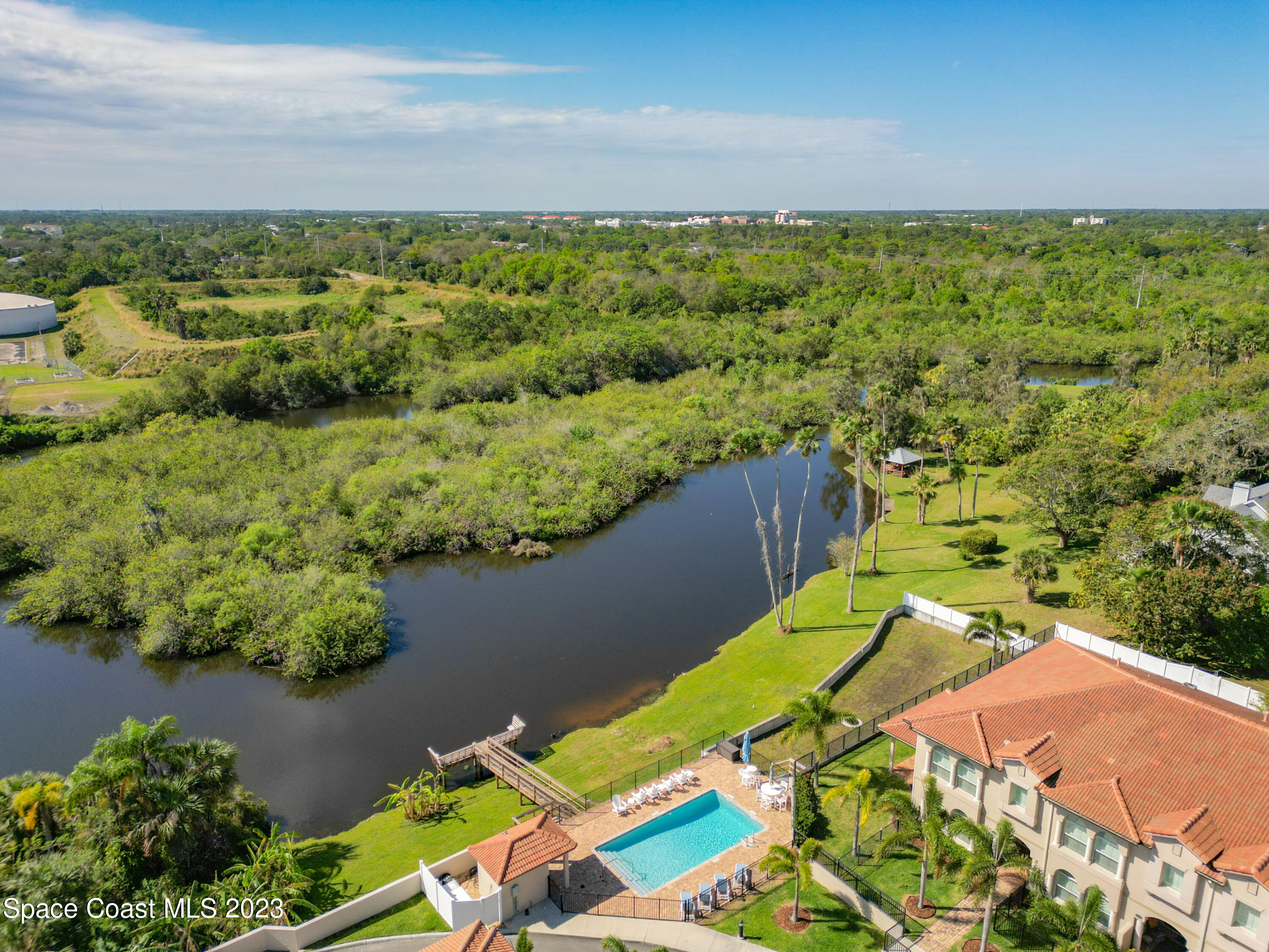 2240 Enjoya Lane Melbourne, FL 32901 - Photo 23 of 31 a view of a lake with a mountain