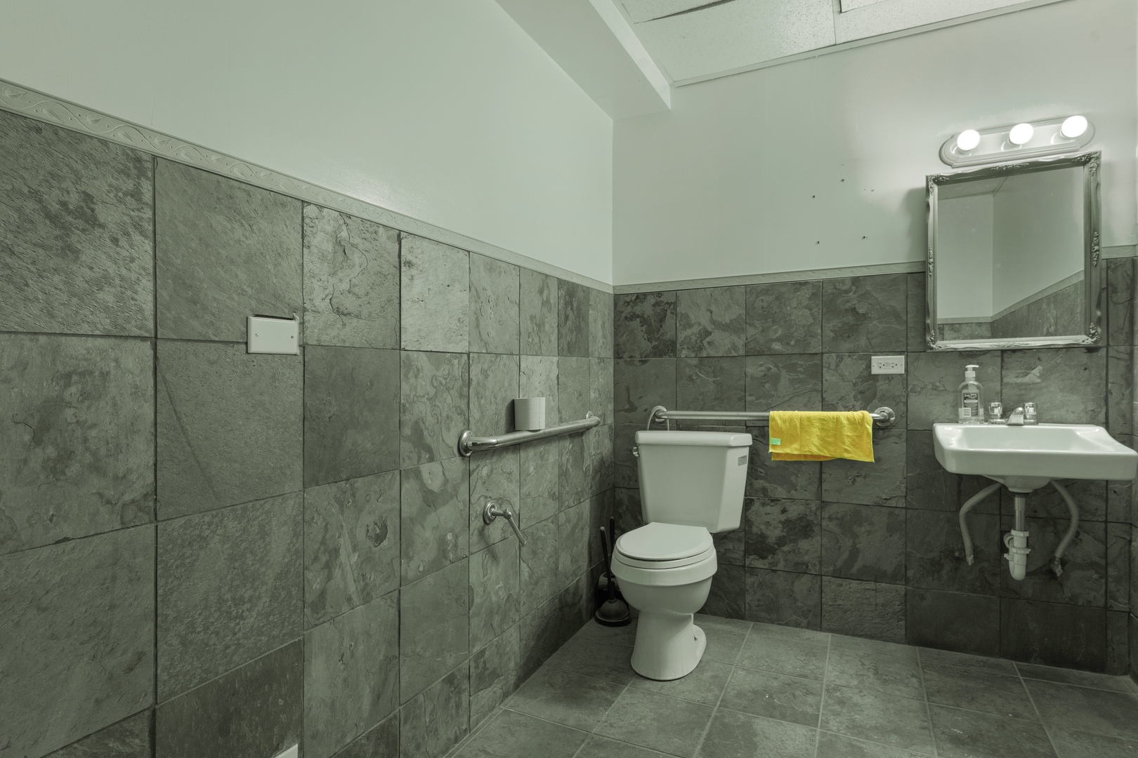 5744 West Irving Park Road Chicago, IL 60634 - Photo 15 of 17 a bathroom with a sink toilet and shower