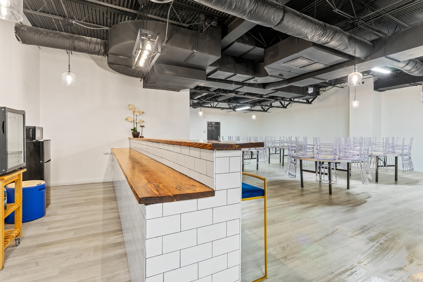 5744 West Irving Park Road Chicago, IL 60634 - Photo 7 of 17 a water heater room with wooden floor