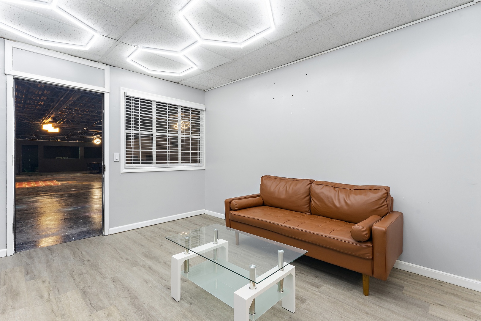 5744 West Irving Park Road Chicago, IL 60634 - Photo 10 of 17 a living room with furniture and window