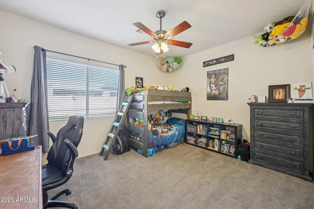 a work room with furniture and window