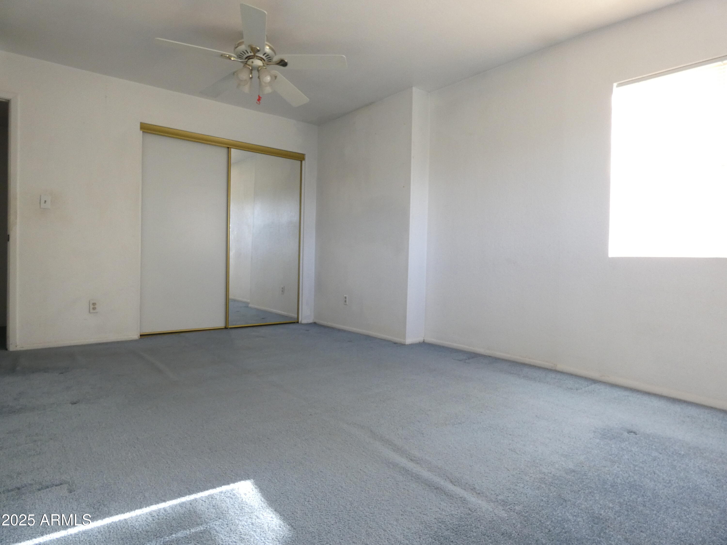 3214 West State Avenue Phoenix, AZ 85051 - Photo 25 of 35 a view of an empty room with a window