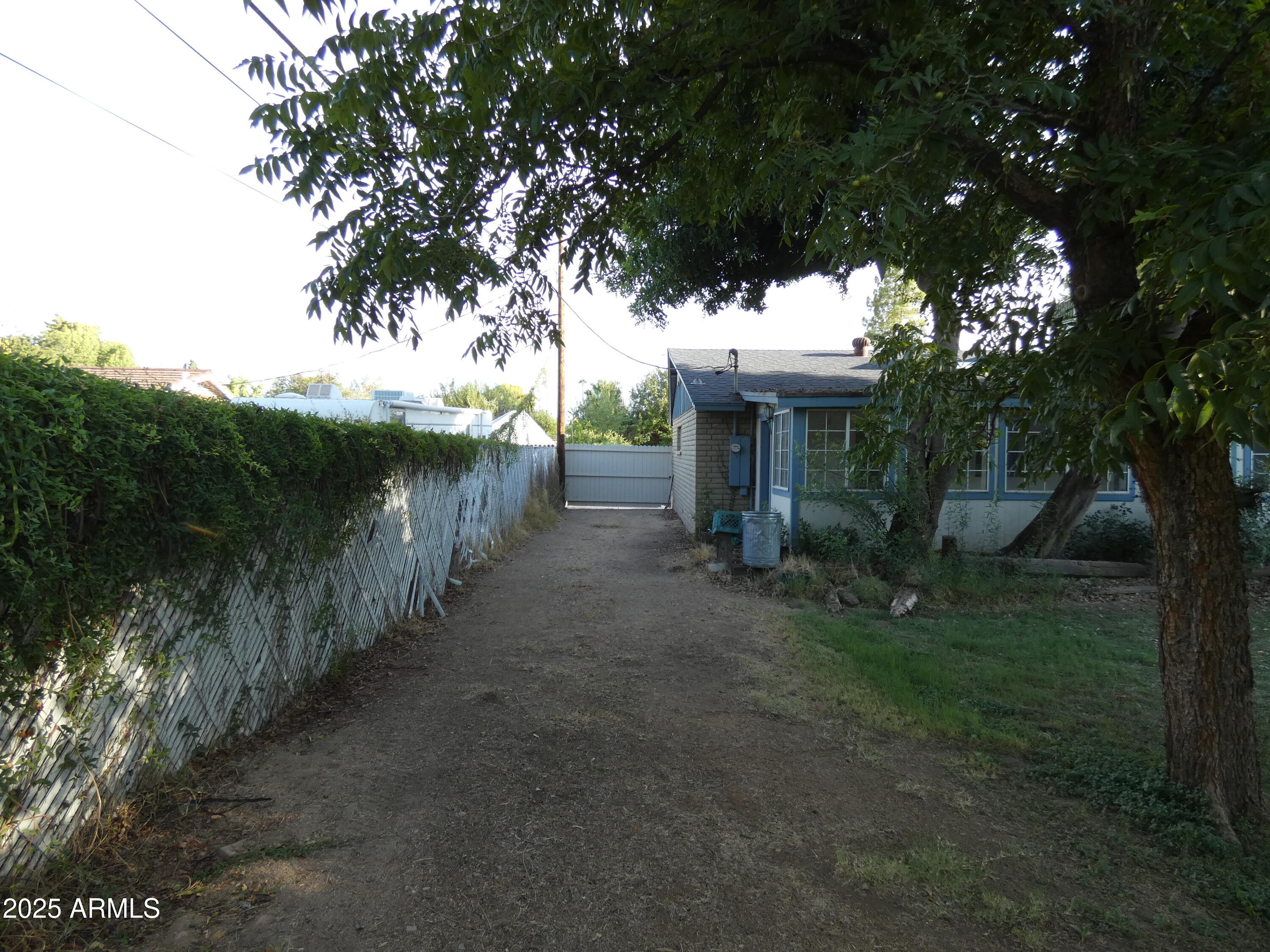 3214 West State Avenue Phoenix, AZ 85051 - Photo 33 of 35 a view of a porch with a tree