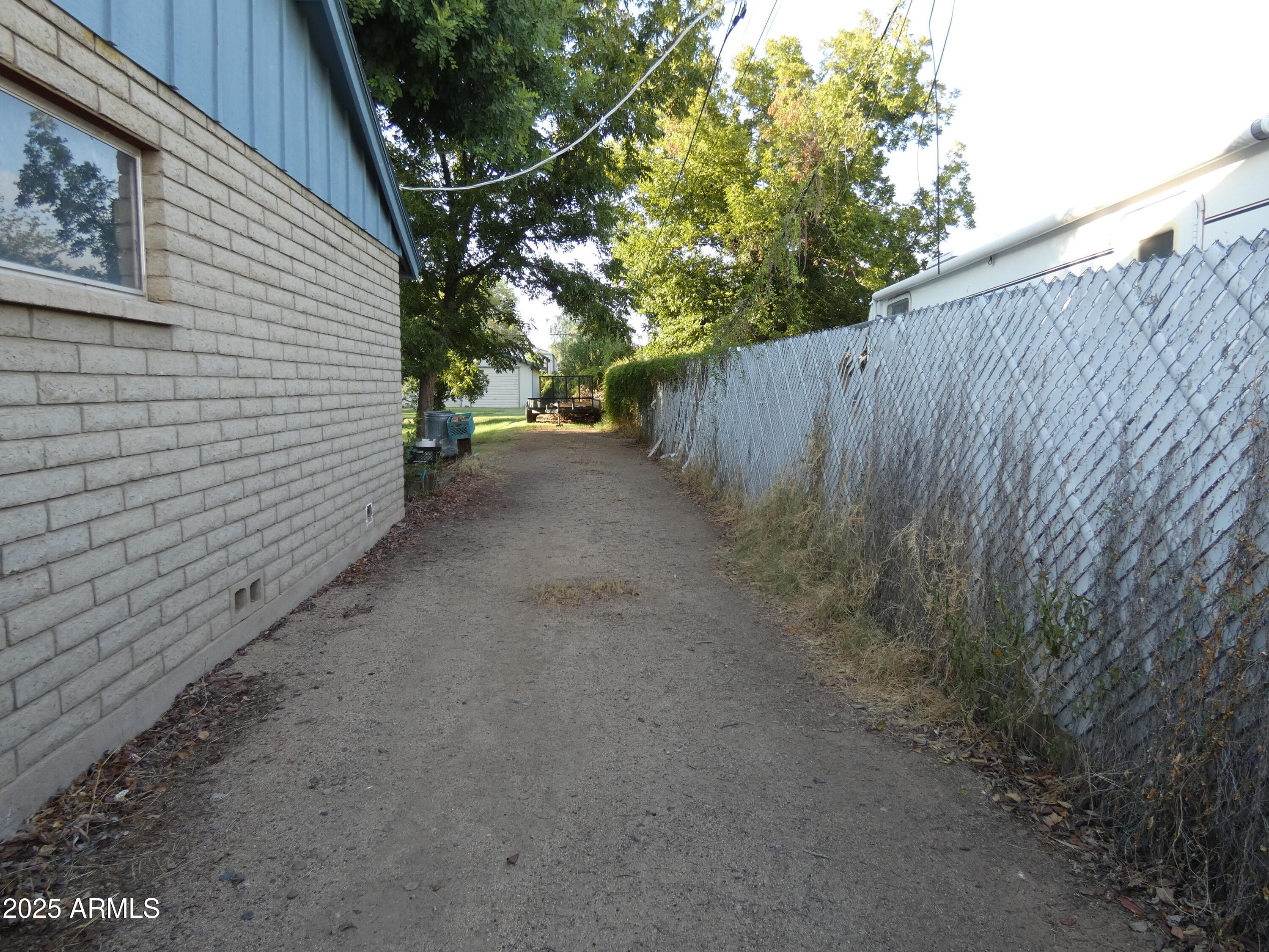 3214 West State Avenue Phoenix, AZ 85051 - Photo 34 of 35 a view of a backyard with green space