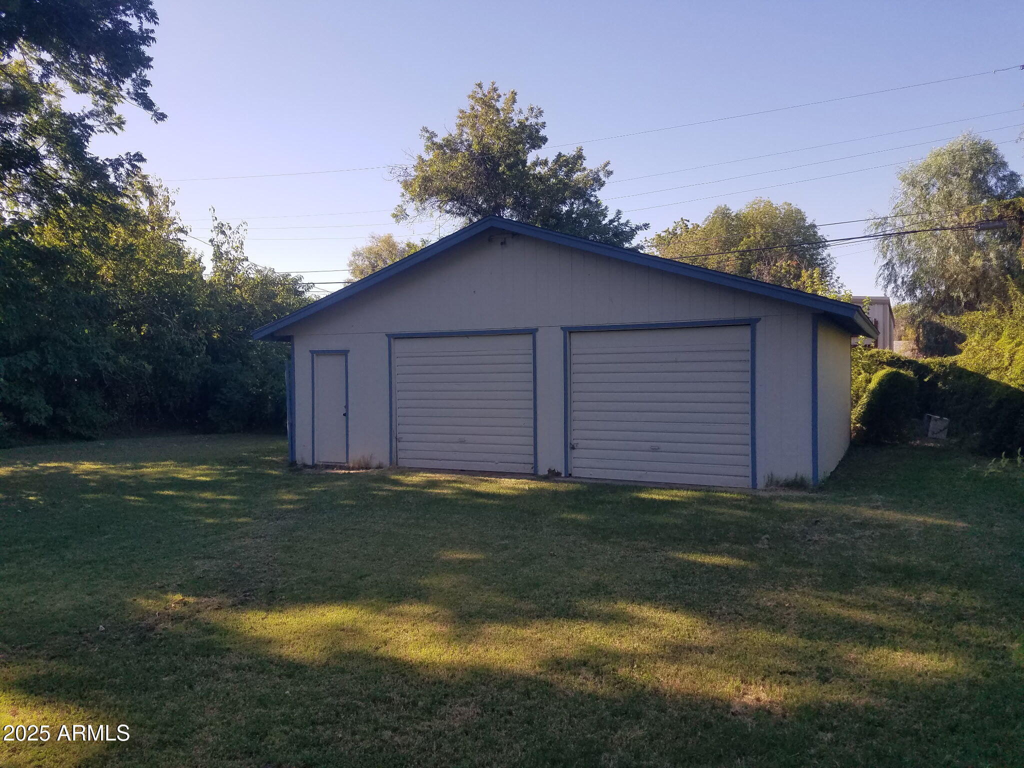 3214 West State Avenue Phoenix, AZ 85051 - Photo 5 of 35 a backyard of a house with lots of green space