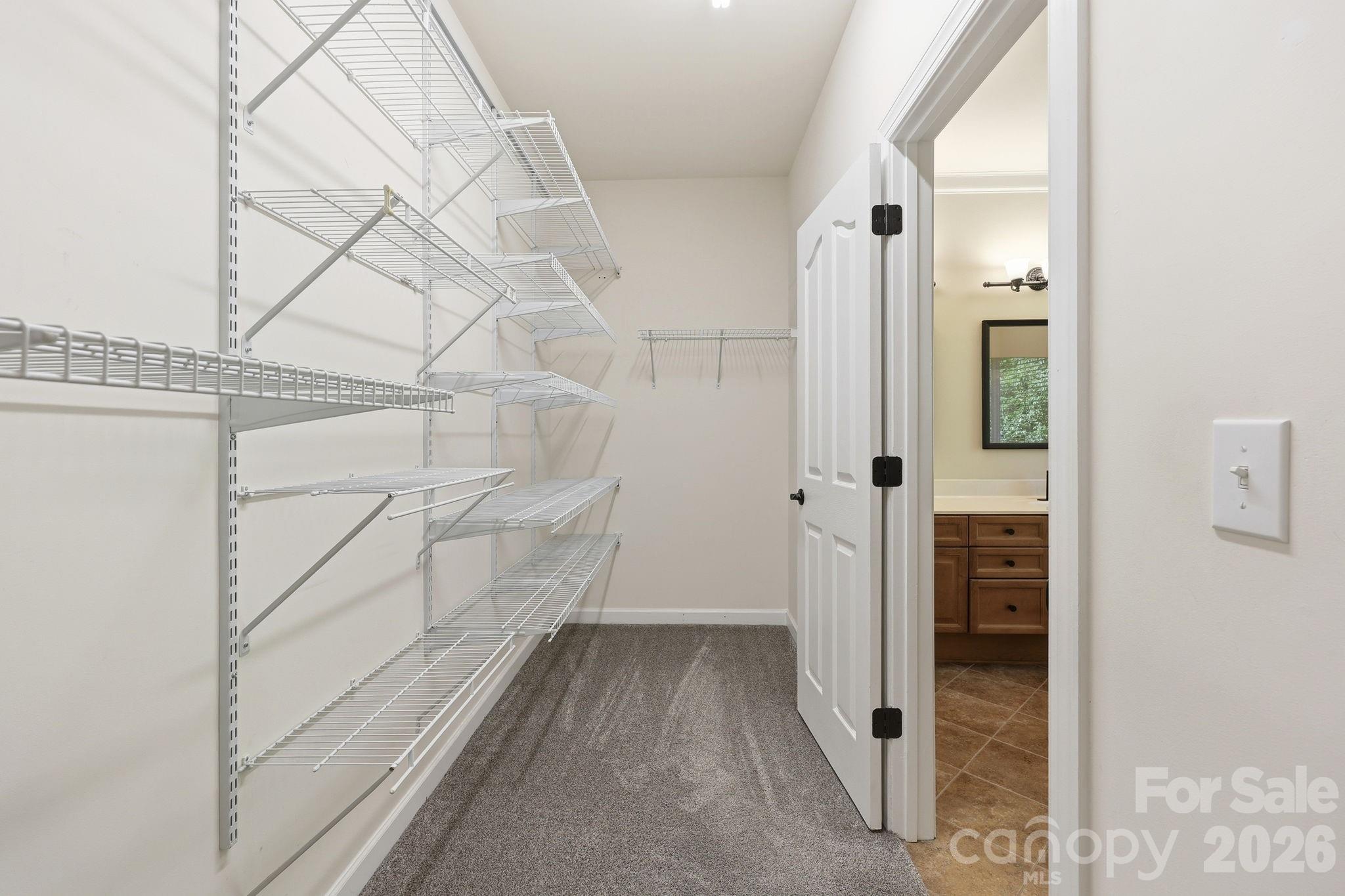 3308 Grandeur Road Charlotte, NC 28269 - Photo 22 of 45 a view of a walk in closet