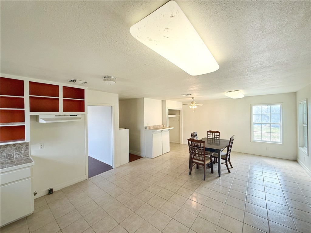 2325 1st Street Ingleside, TX 78362 - Photo 12 of 31 a view of a dining room with furniture and window