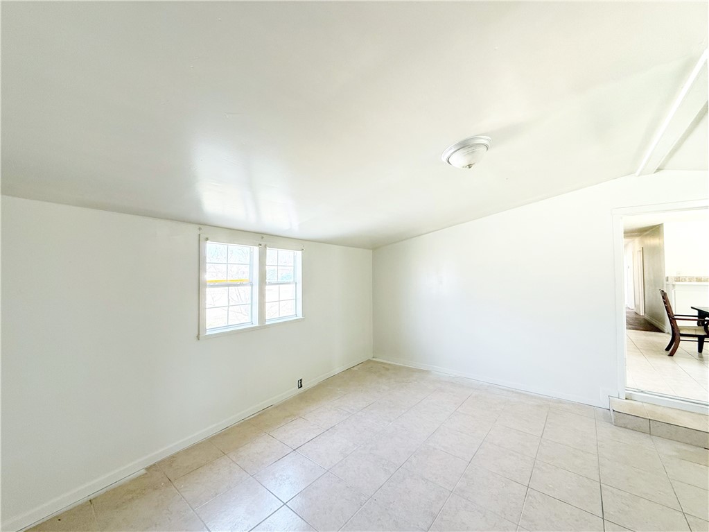 2325 1st Street Ingleside, TX 78362 - Photo 22 of 31 an empty room with a empty space and window