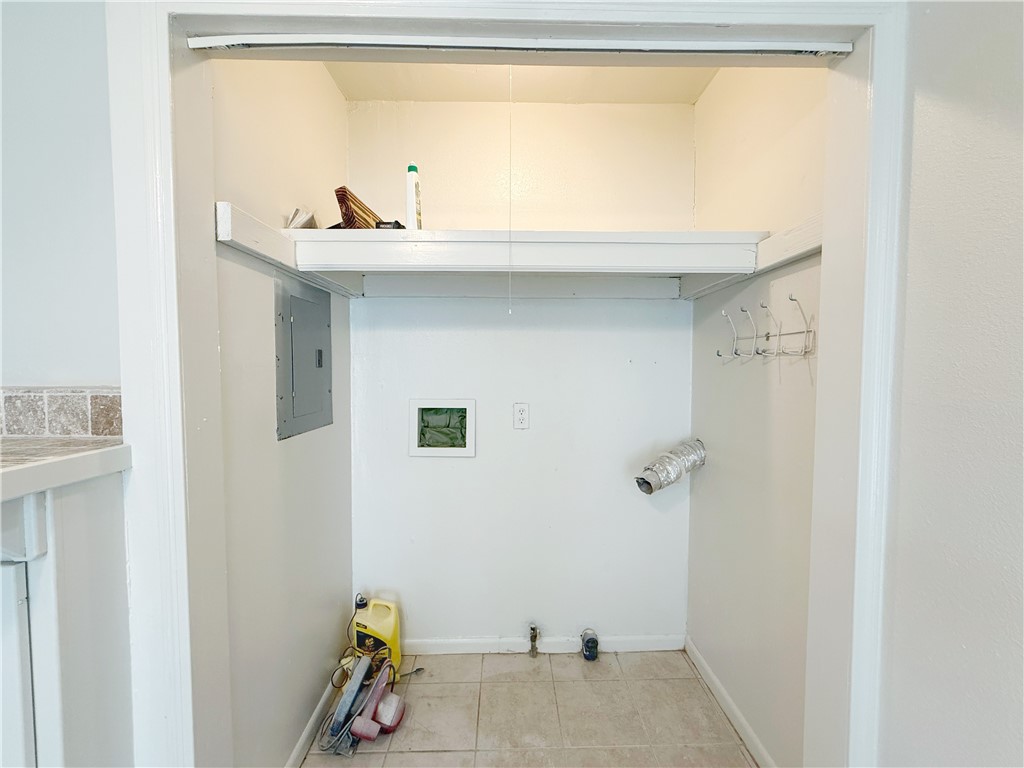 2325 1st Street Ingleside, TX 78362 - Photo 27 of 31 a bathroom with a sink and a window