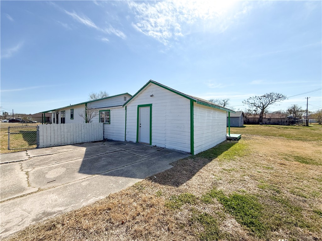 2325 1st Street Ingleside, TX 78362 - Photo 30 of 31 a view of a house with a yard