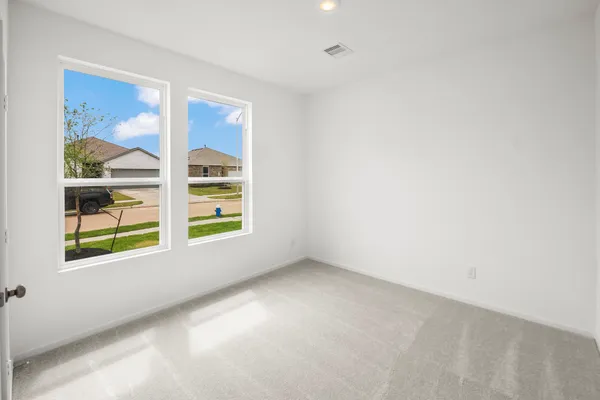 a kitchen with stainless steel appliances granite countertop a sink and a wooden floors