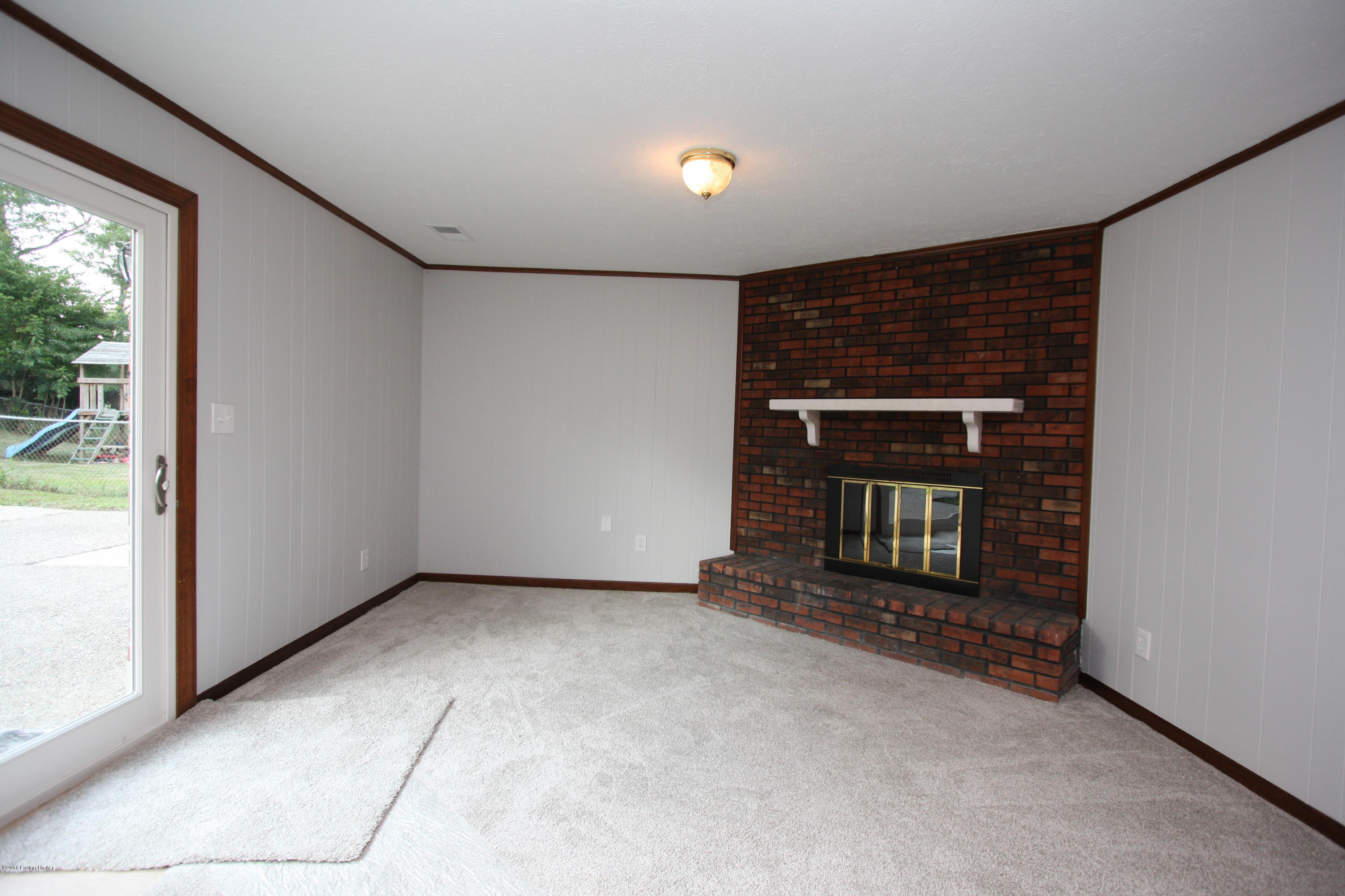 3712 Longview Road Jeffersontown, KY 40299 - Photo 8 of 35 Lower level family room--new door to patio.