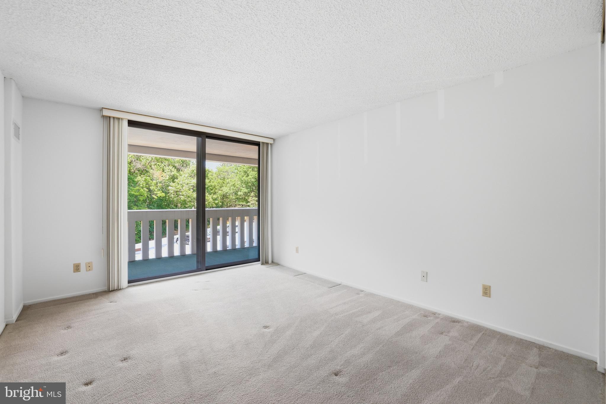 6101 Edsall Road, Unit 502 Alexandria, VA 22304 - Photo 22 of 33 Generous second bedroom with balcony access