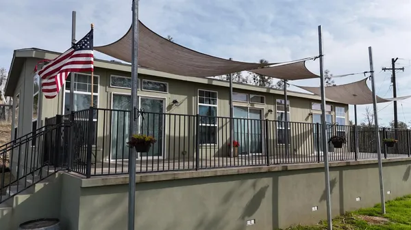 a view of a house with a balcony