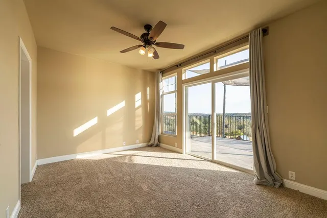 a bathroom with a toilet and a tub