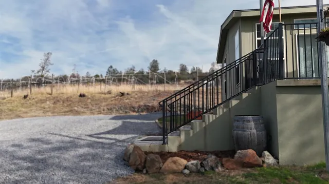 a view of a kitchen with a sink and a window