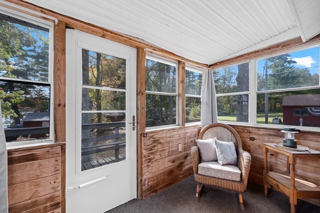 79 7th Street Brimfield, MA 01010 - Photo 12 of 32 a living room with furniture and floor to ceiling windows