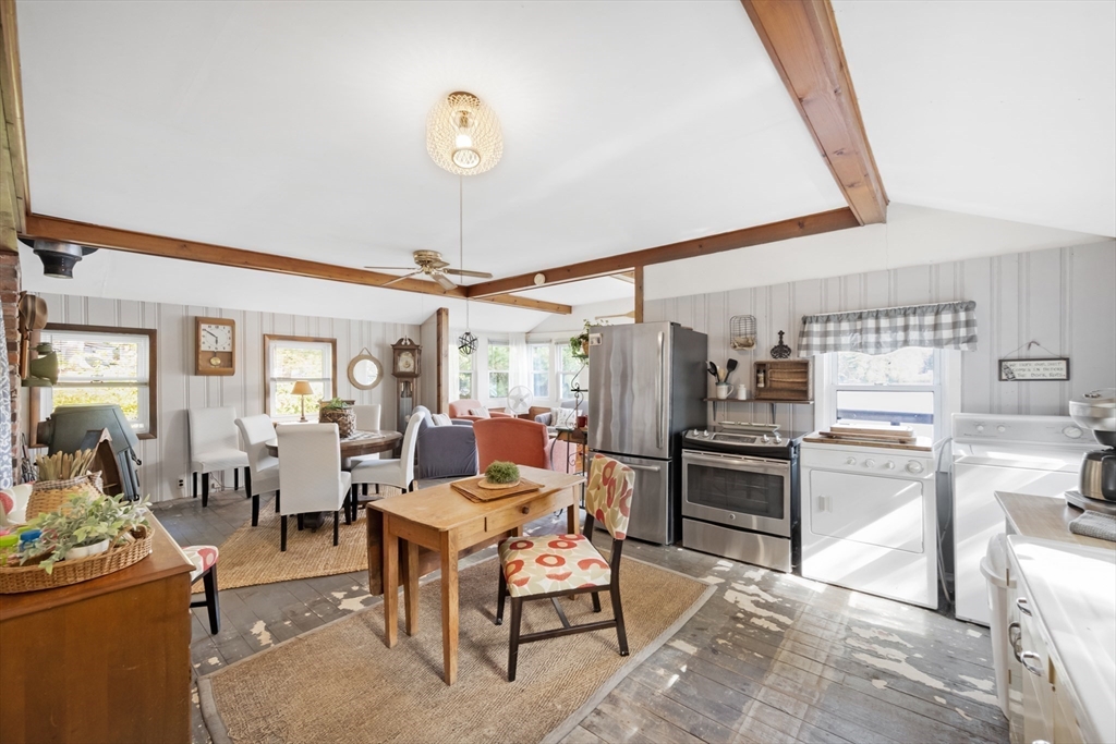 79 7th Street Brimfield, MA 01010 - Photo 14 of 32 a living room with furniture and a floor to ceiling window