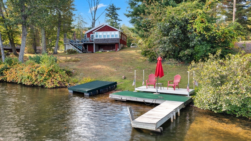 79 7th Street Brimfield, MA 01010 - Photo 3 of 32 an aerial view of a house with swimming pool and a yard