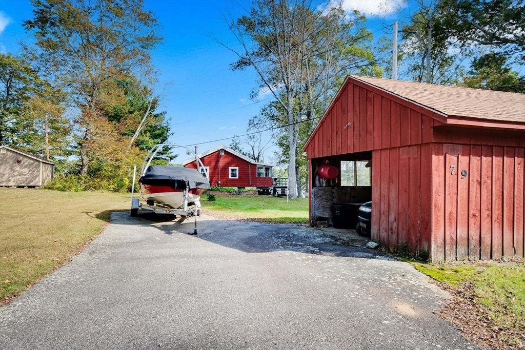 79 7th Street Brimfield, MA 01010 - Photo 7 of 32 a house view with a garden space
