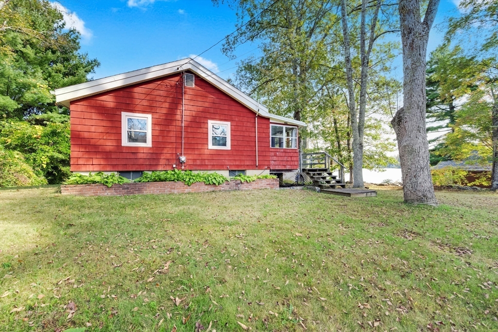 79 7th Street Brimfield, MA 01010 - Photo 9 of 32 a view of a house with a yard and tree s