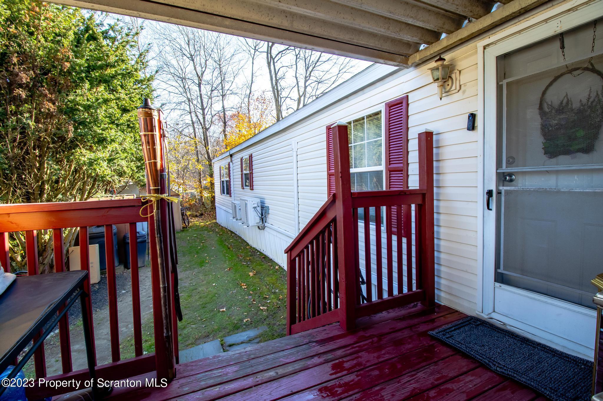 45 Honor Park Moosic, PA 18507 - Photo 13 of 16 a view of a house with backyard and deck
