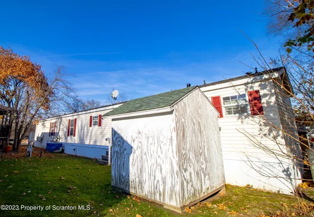 a view of back yard of the house