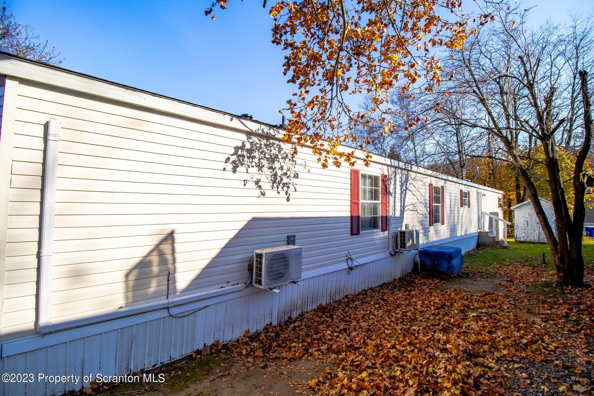 45 Honor Park Moosic, PA 18507 - Photo 16 of 16 a front view of a house with garden