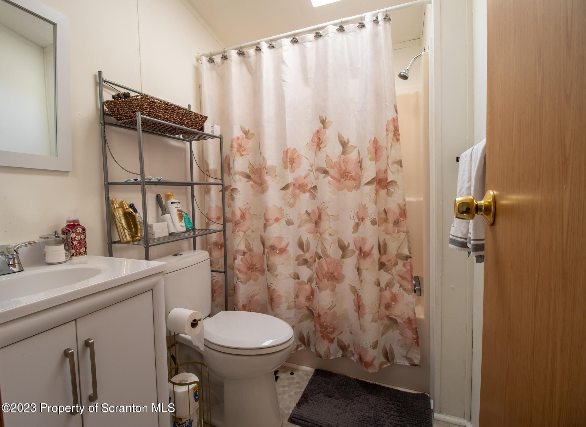 45 Honor Park Moosic, PA 18507 - Photo 9 of 16 a bathroom with a sink toilet and shower
