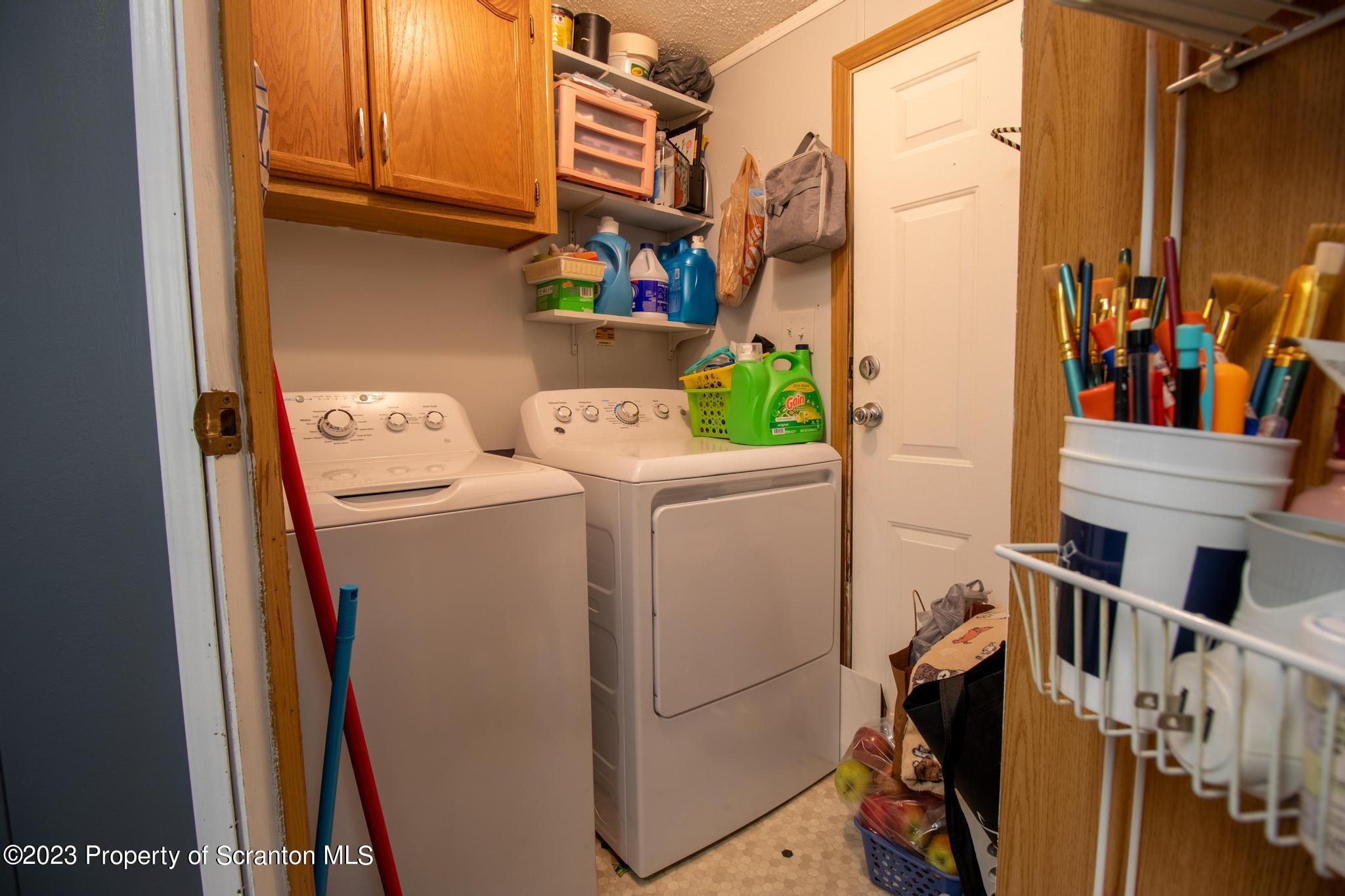 45 Honor Park Moosic, PA 18507 - Photo 10 of 16 a utility room with dryer and washer
