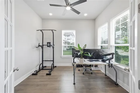 a view of a livingroom with furniture and a window