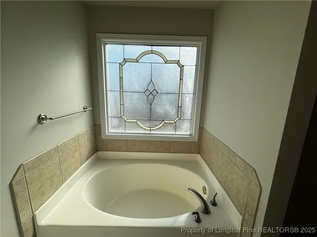 a bathroom with a tub