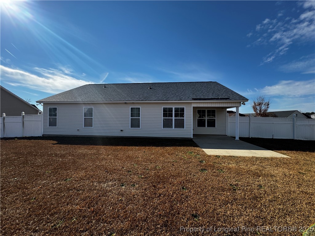1328 St Johns Loop Raeford, NC 28376 - Photo 25 of 27 a house view with a backyard space