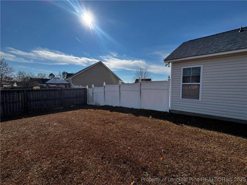 1328 St Johns Loop Raeford, NC 28376 - Photo 27 of 27 a backyard of a house