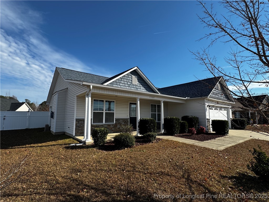 1328 St Johns Loop Raeford, NC 28376 - Photo 3 of 27 a view of a house with a yard