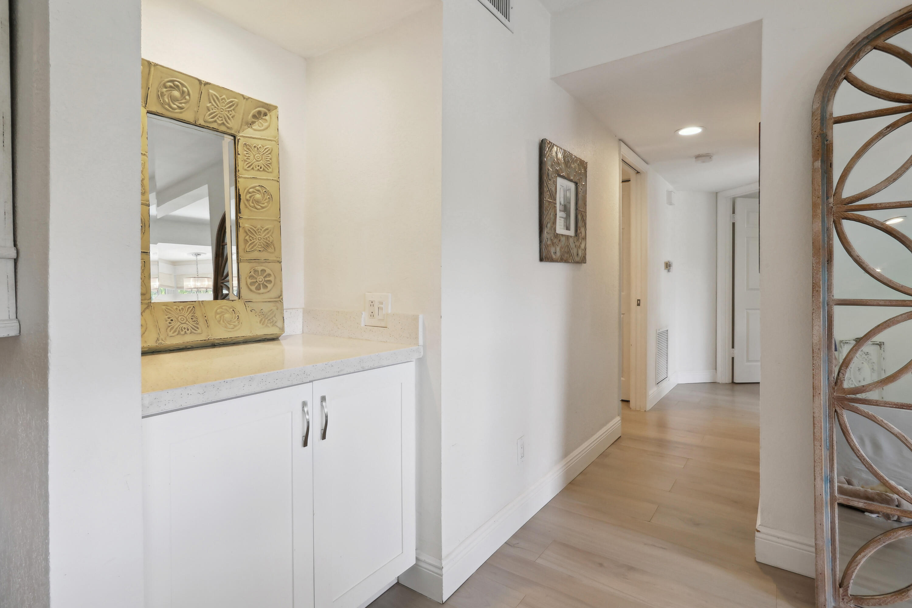 5631 Coach House Circle, Unit D Boca Raton, FL 33486 - Photo 14 of 17 Snack Bar- Hallway
