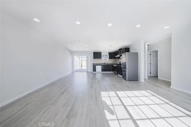 a view of a livingroom from a hallway