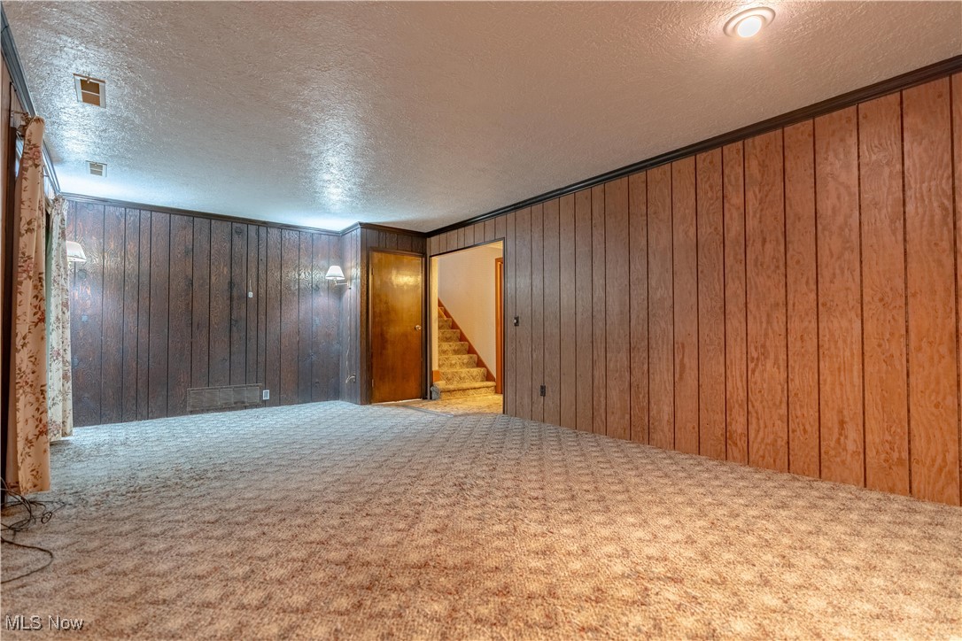 5535 Veldon Circle Northeast Canton, OH 44721 - Photo 27 of 41 Large family room with fireplace.