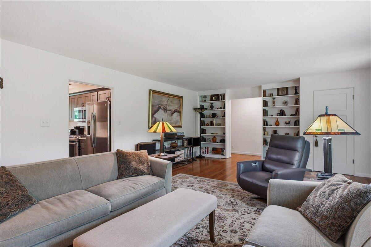 63 Ski Hill Road Portage, IN 46368 - Photo 11 of 28 a living room with furniture and a lamp