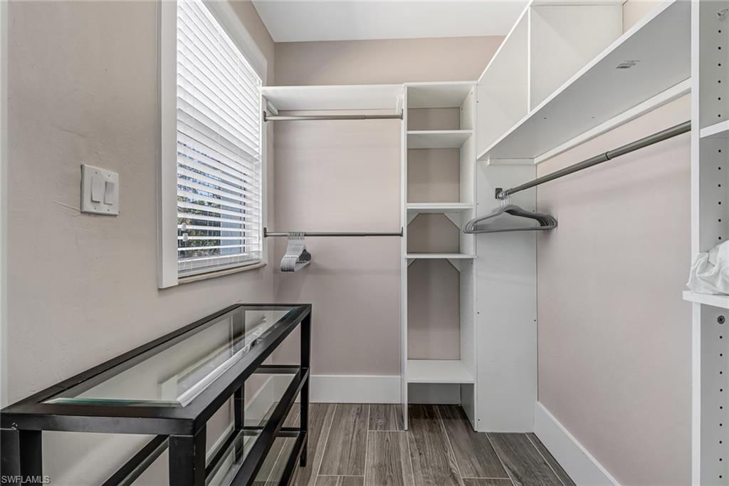 3470 Lakeview Drive Naples, FL 34112 - Photo 7 of 16 a view of wooden floor in a room