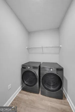a view of washer and dryer in a utility room